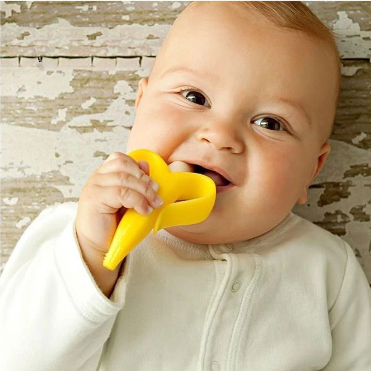 Baby banaan tandenborstel/bijtspeeltje – Geel - baby tandenborstel - bij doorkomende tandjes - tandvlees massage - babytandenborstel - peuter tandenborstel